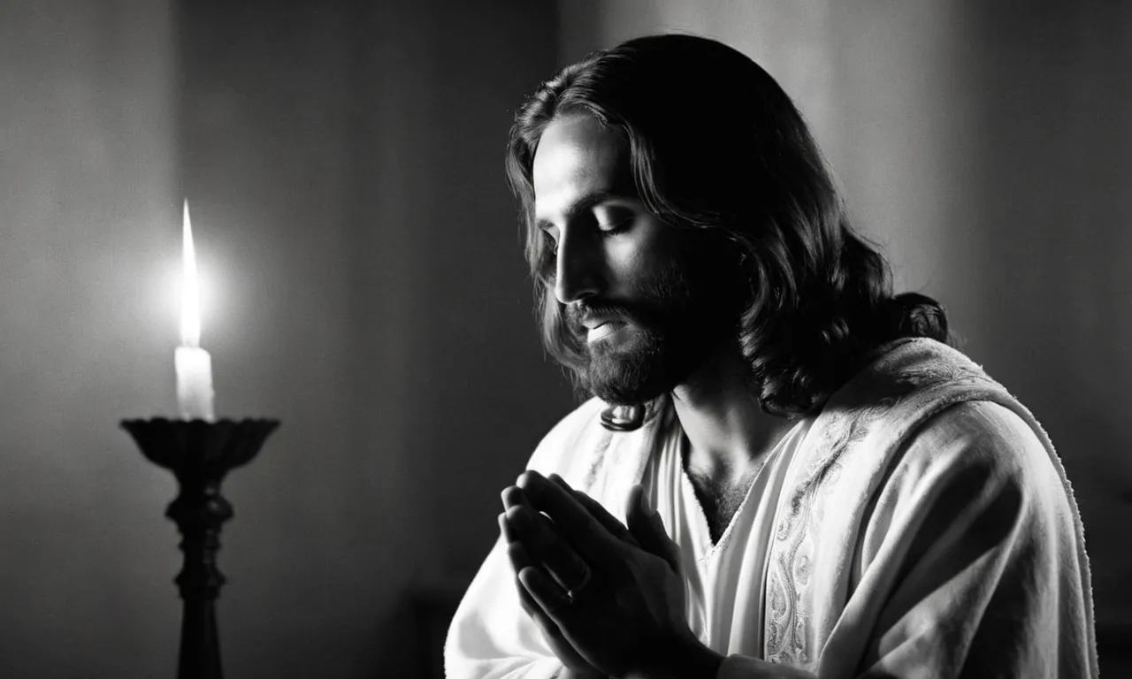 A powerful black-and-white image captures Jesus kneeling in solitude, hands clasped in prayer, surrounded by flickering candlelight and a serene aura, symbolizing the depth and purpose behind His prayers.
