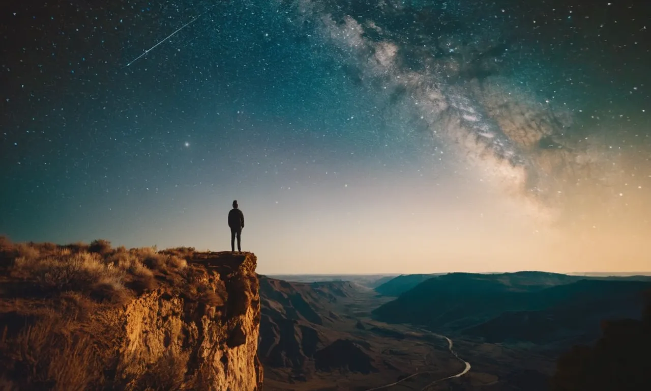 A person stands at the edge of a cliff, looking out at a vast, star-filled sky, symbolizing the wonders of the universe and the absence of a divine being.