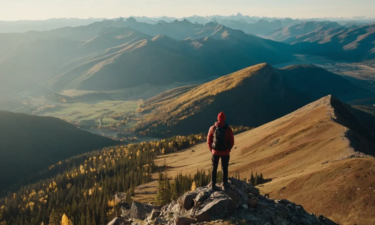 A photo of a person standing on a mountain peak, looking out at a breathtaking view, with a small figure of God subtly etched into the landscape.