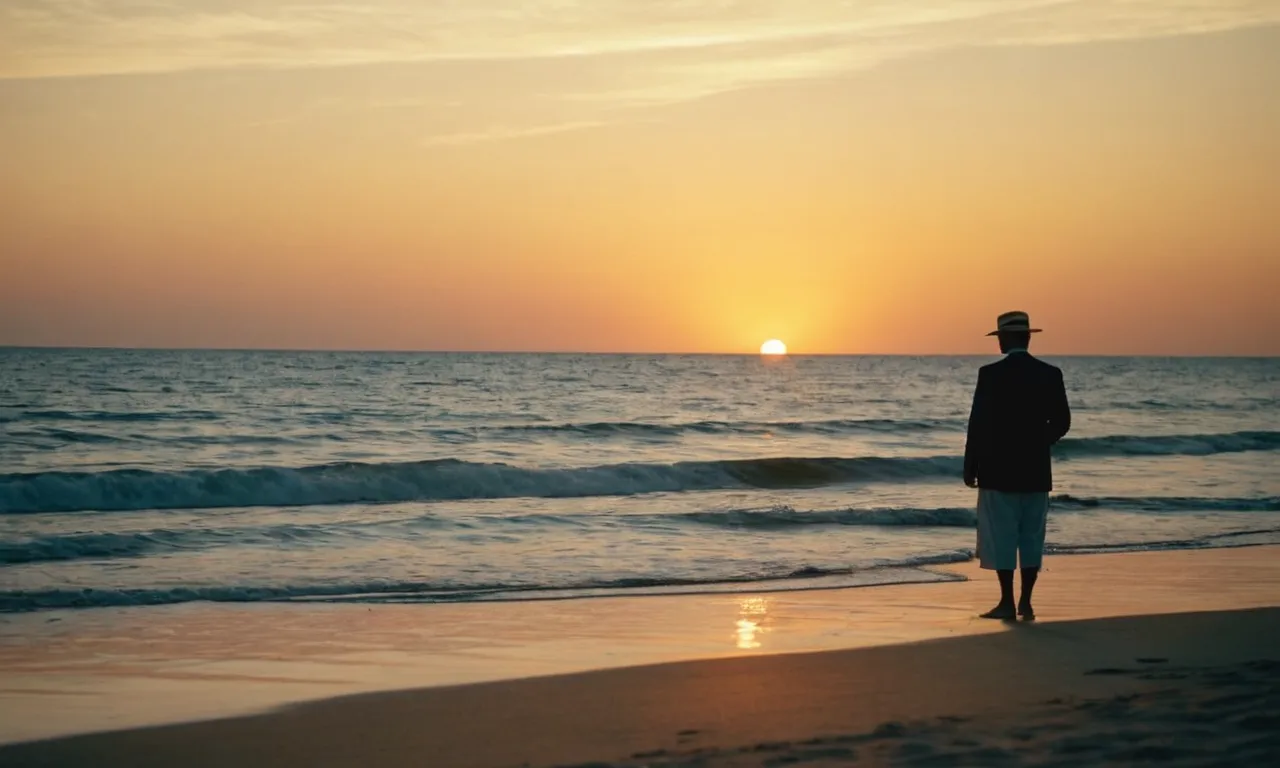 A tranquil image of a serene beach at sunset, where a solitary figure gazes at the horizon, symbolizing the inner peace and contentment that comes when God guides one towards retirement.