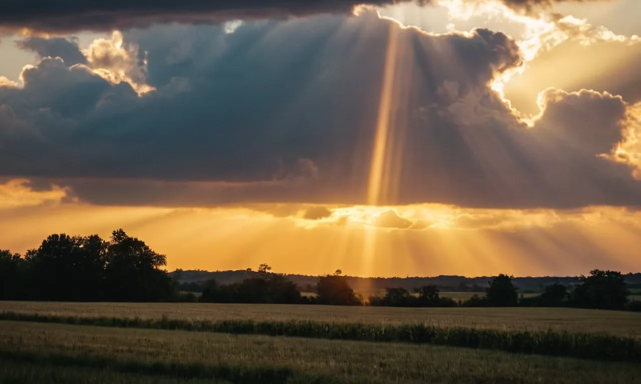 A photograph capturing a breathtaking sunset, where golden rays pierce through the clouds, illuminating the sky, symbolizing God's love radiating through nature.