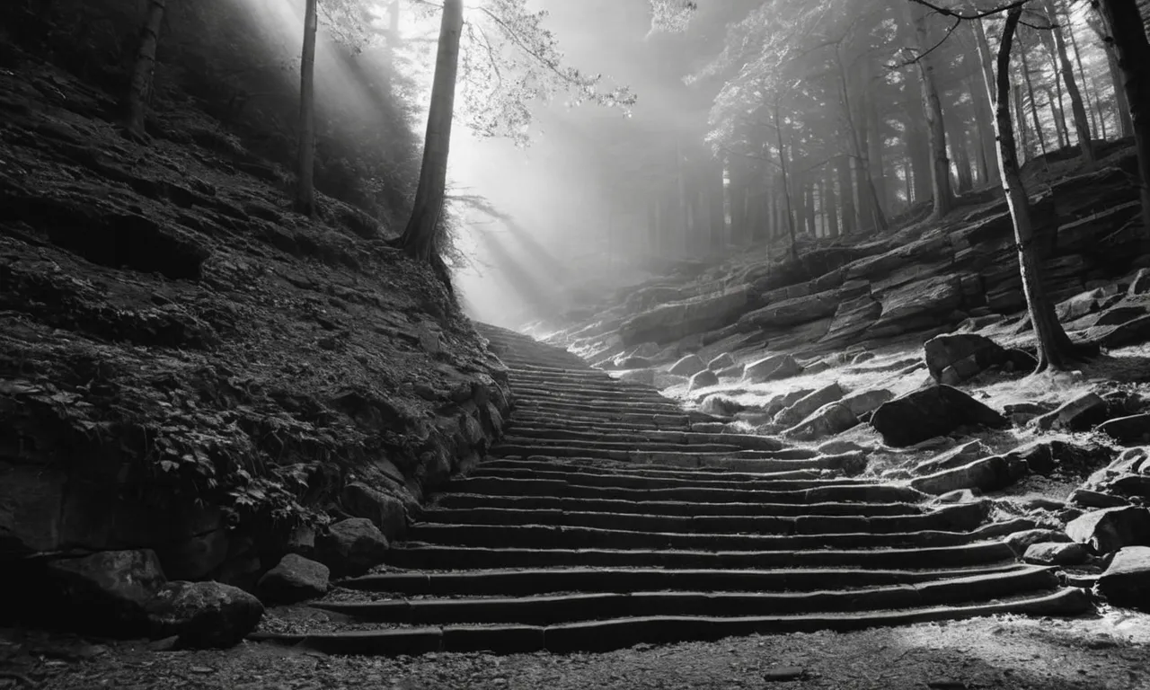 A captivating black-and-white photograph captures a winding stone staircase, bathed in ethereal light, reminiscent of Jacob's Ladder, evoking a sense of mystery and spiritual journey.