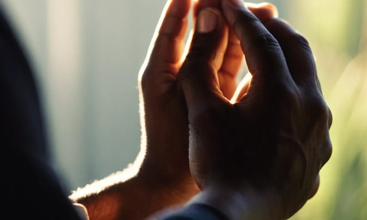 A close-up photograph of hands clasped in prayer, with rays of sunlight filtering through the fingers, capturing the deep connection and devotion one has with God.