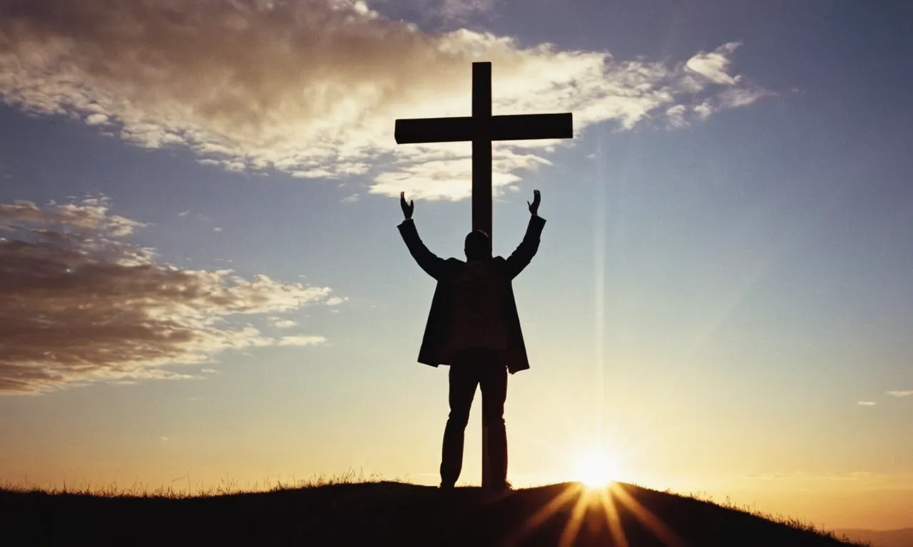 A photograph capturing a person's silhouette against a radiant sunset, symbolizing salvation through Jesus, as they reach out towards a cross standing tall on a hill, a beacon of hope and redemption.
