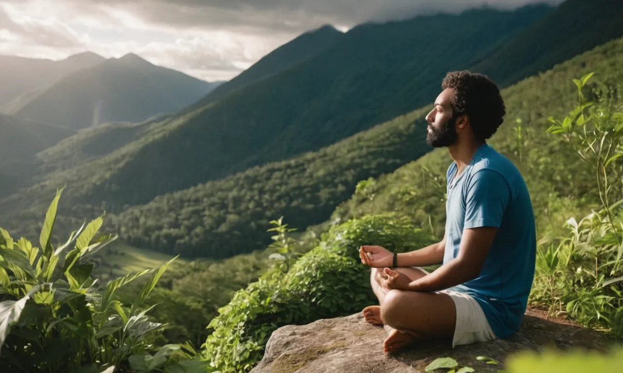 A serene photograph capturing a person sitting cross-legged on a mountaintop, eyes closed in deep meditation, surrounded by lush greenery, as rays of sunlight pierce through the clouds, symbolizing finding inner peace with God.