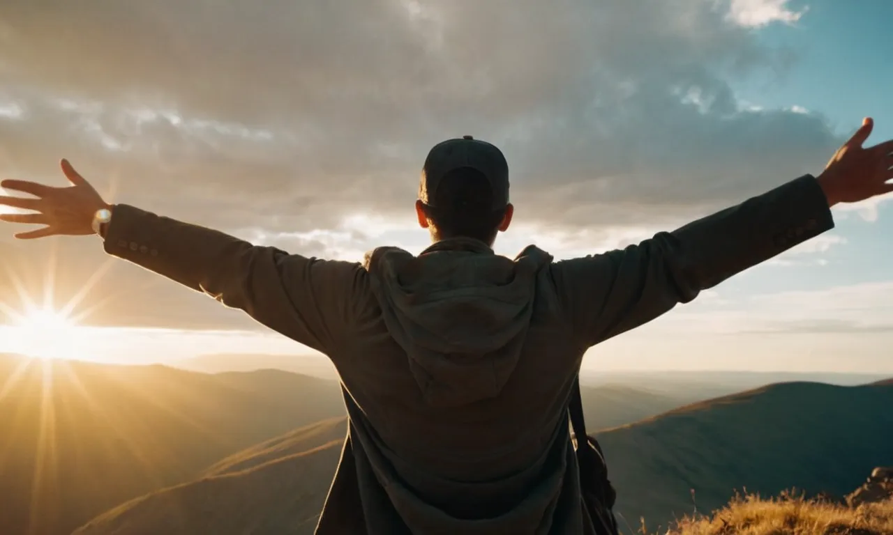 A captivating photo capturing a person with outstretched arms, standing on a mountaintop, bathed in golden light, as the sun breaks through the clouds, symbolizing the release of God's power in their life.