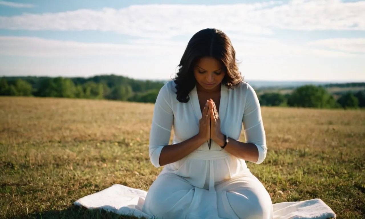 A photograph capturing a person kneeling in prayer, with their hands clasped tightly, eyes closed, and a serene expression, symbolizing the act of surrendering one's heart to God.
