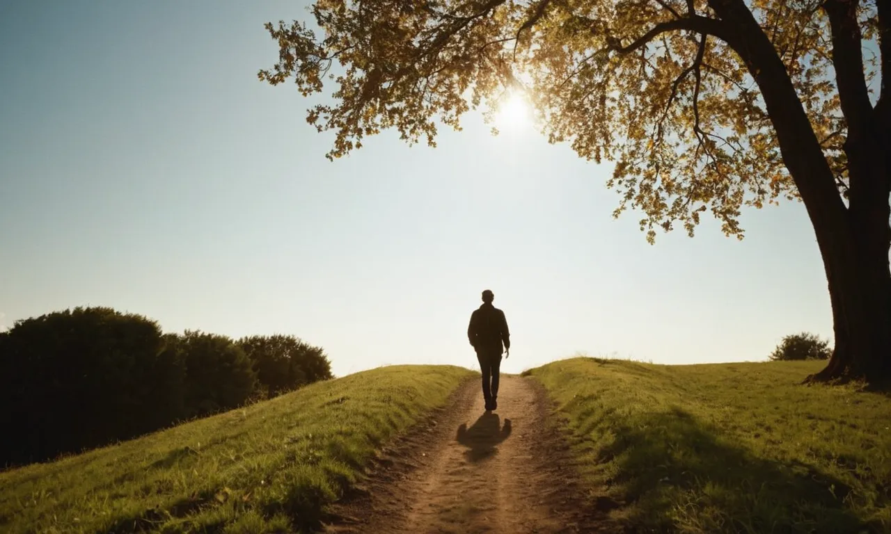A serene photograph captures the silhouette of a person walking along a sunlit path, their hand outstretched towards the sky, symbolizing the intimate connection and guidance of walking with God.