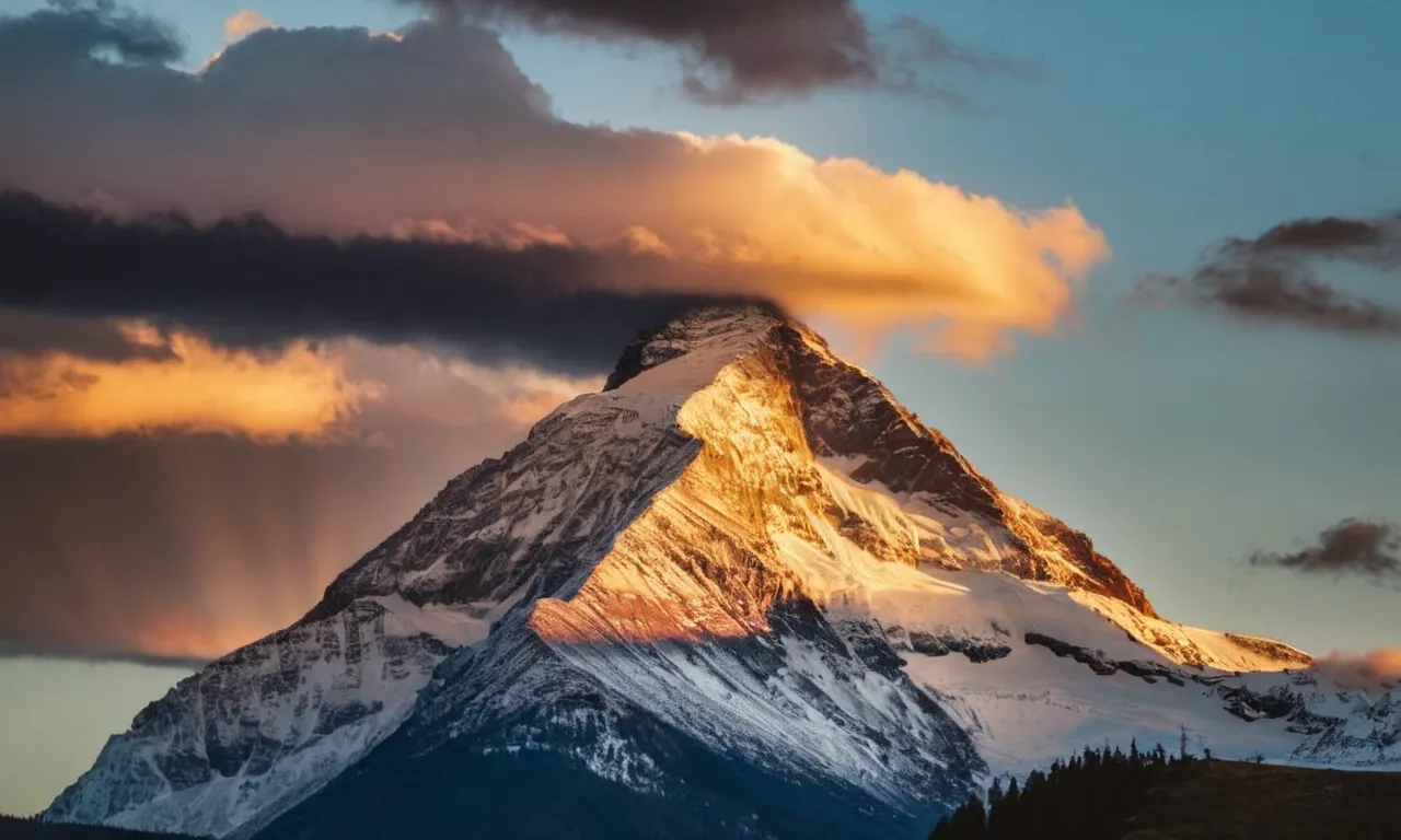 A photo capturing a serene sunset over a mountain peak, with a beam of light shining down, symbolizing how Elijah was called by God to fulfill his divine purpose.