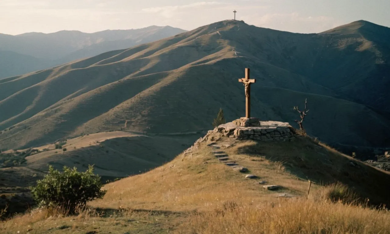 A powerful image capturing the solemnity of the place where Jesus was crucified: A weathered cross standing tall against the backdrop of a hauntingly serene hill, invoking a sense of reverence and reflection.