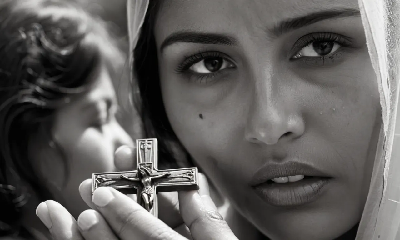 A black and white photo captures a sorrowful woman clutching a small wooden cross, her tear-stained face reflecting the pain of a mother who lost her son, echoing biblical grief.