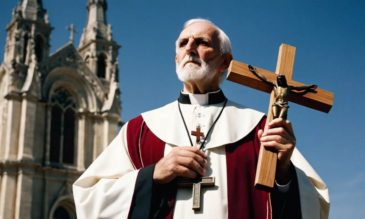A photo capturing a Catholic priest holding a crucifix, symbolizing the belief that Jesus is the Son of God who sacrificed himself for the salvation of humanity.