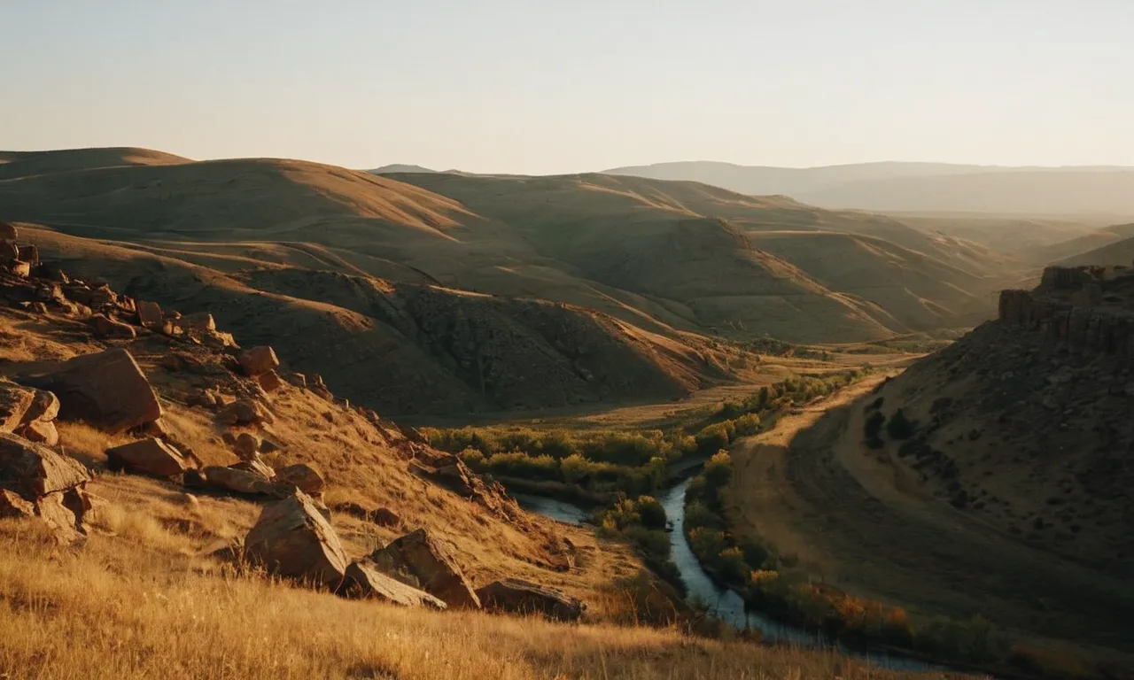 A photo of a rugged landscape, bathed in warm golden light, depicting the Promised Land of Canaan, symbolizing a land of abundance, fulfillment, and divine blessings mentioned in the Bible.