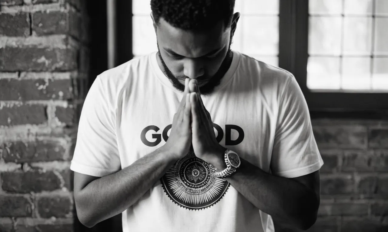 A captivating black and white image capturing a person of diverse ethnicity, with hands clasped in prayer, wearing a "God is Dope" t-shirt, symbolizing unity, faith, and empowerment.