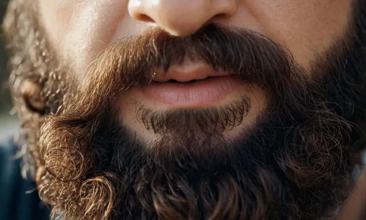 A close-up photo showcasing the intricate details of a bearded man's face, capturing the essence of strength, wisdom, and reverence, echoing the biblical teachings on the significance of beards.