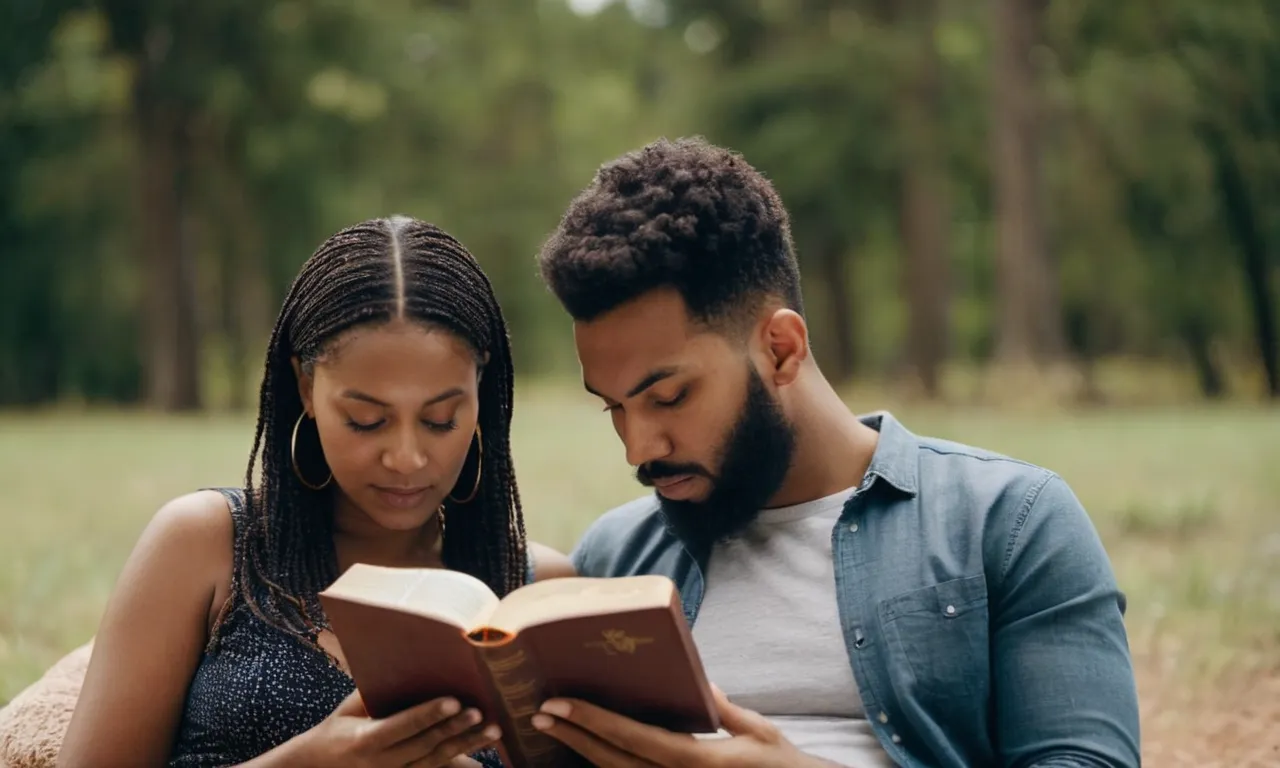 A photo capturing a couple reading the Bible together, their heads bent close, symbolizing the importance of spiritual connection and seeking guidance in their relationship.