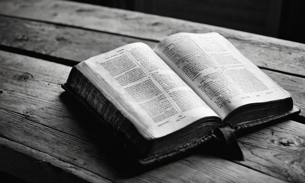 A black and white photo of a weathered Bible lying open on a dimly lit table, highlighting verses on hope and healing amidst depression.