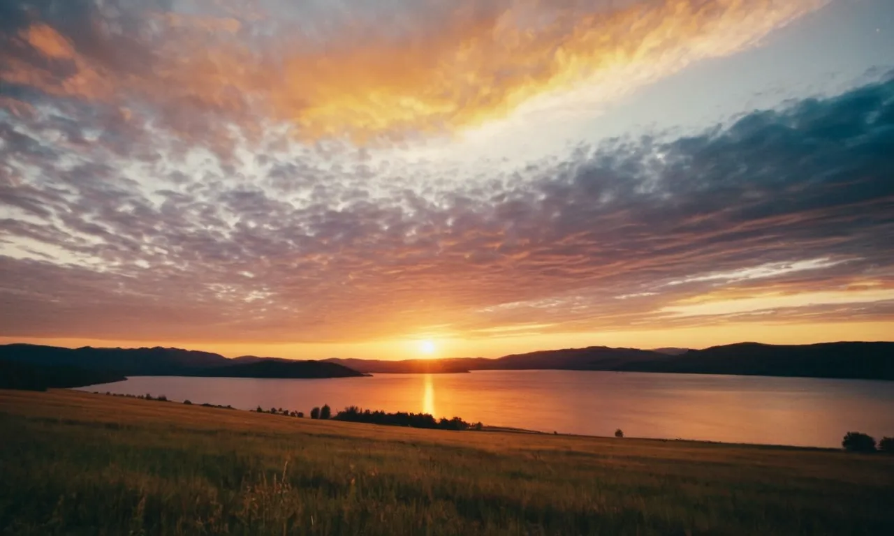 A vibrant photo capturing a sunset over a serene landscape, symbolizing God's creation, reminding us to embrace the beauty of life and find joy in His blessings.