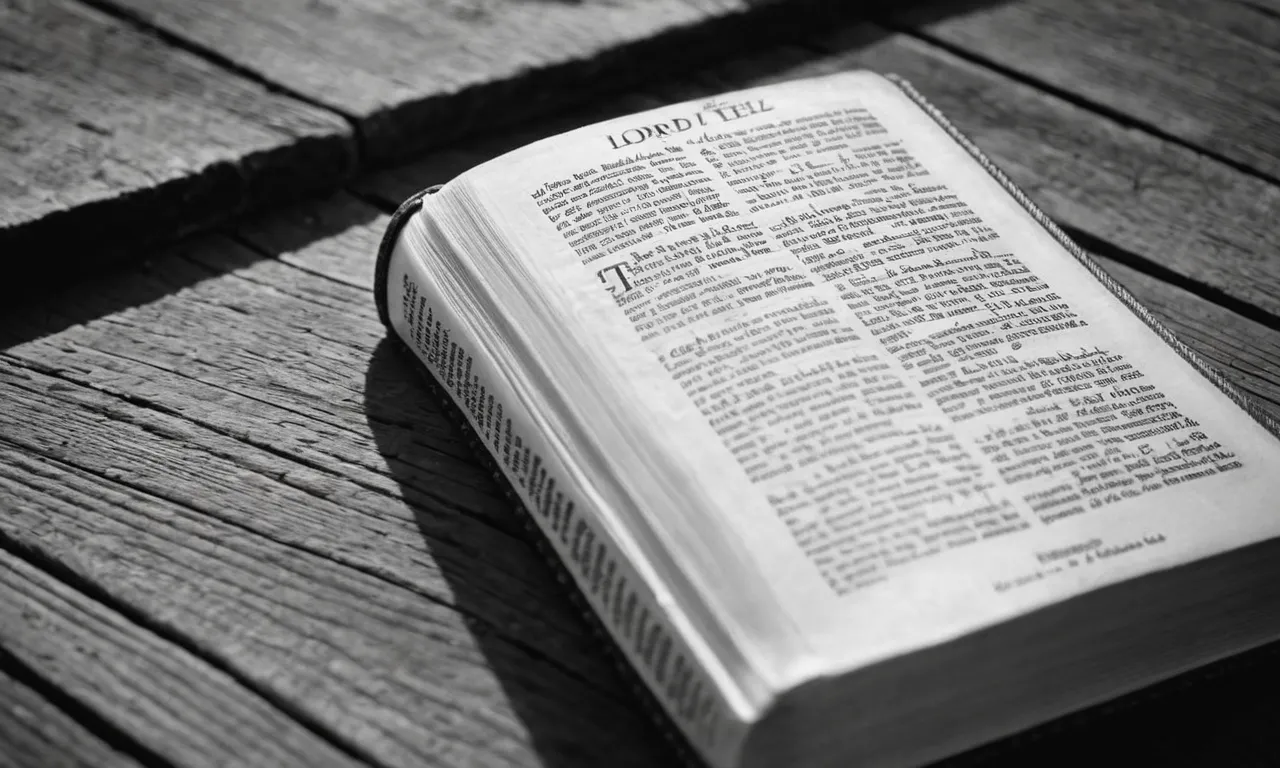 A black and white photo captures a Bible open to Proverbs 12:22, revealing the words "The Lord detests lying lips, but delights in those who tell the truth."