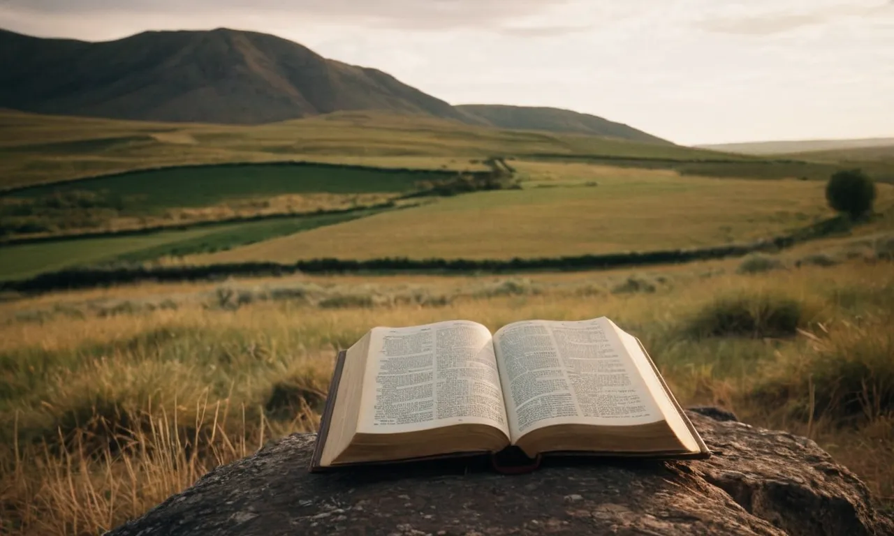 A solitary figure reads the Bible, surrounded by a serene landscape. The image captures the essence of "minding your own business" as one finds solace and wisdom in personal reflection.