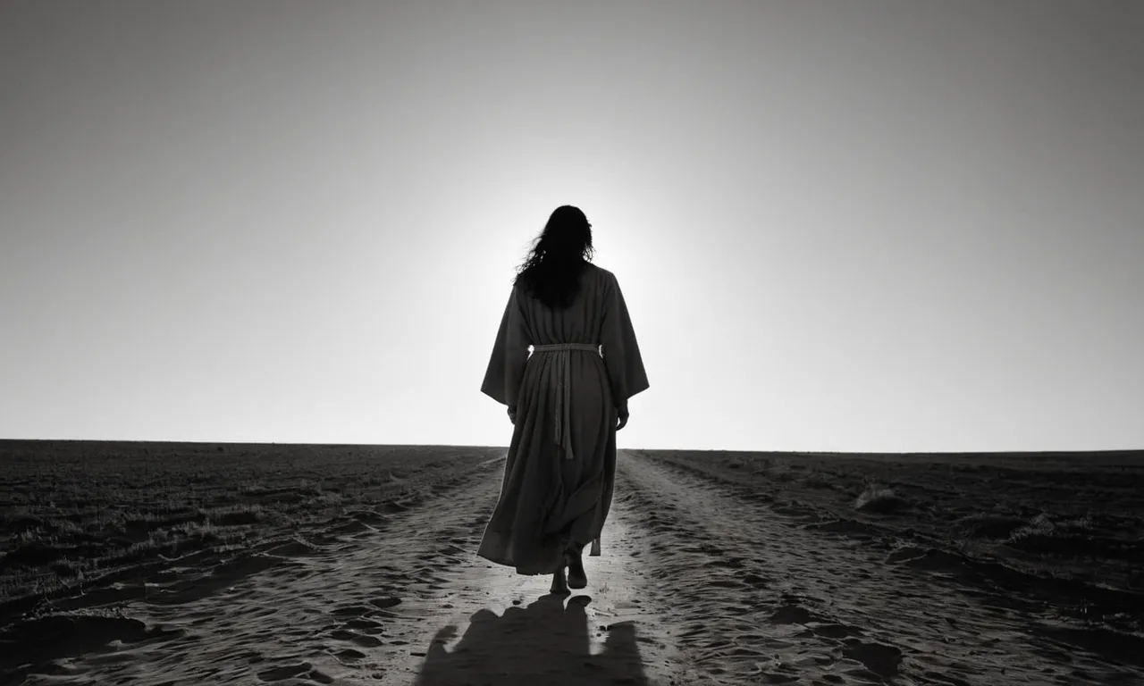 A black and white photo of a solitary figure walking towards a sunrise, symbolizing Mary Magdalene's journey of faith and transformation after Jesus' death.