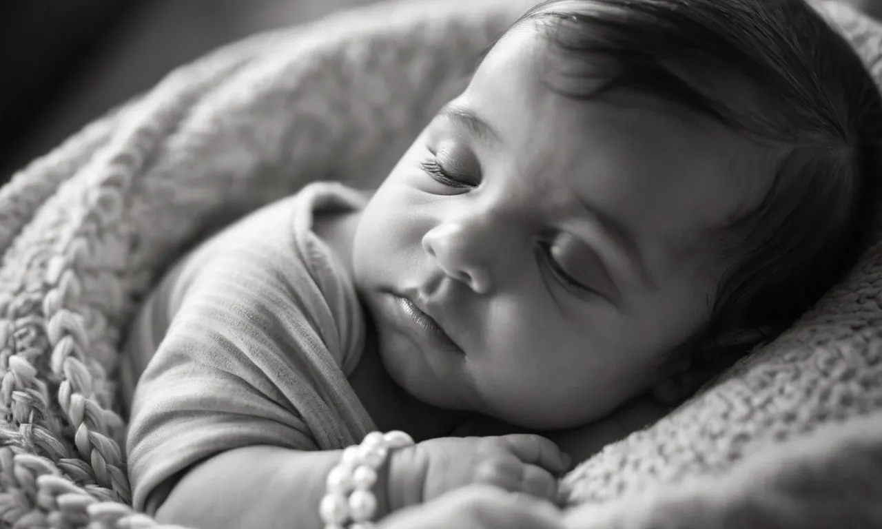 A black and white photo captures a newborn baby cradled in their mother's arms, reflecting the purest form of love and life, symbolizing the greatest gift God bestowed upon humanity.