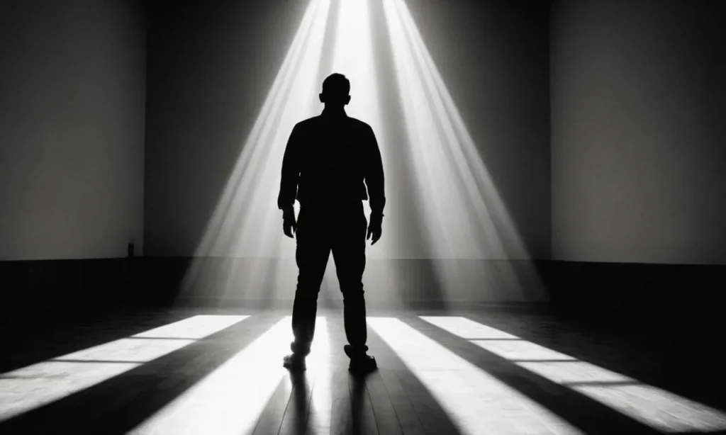 A black and white photograph capturing the silhouette of a person standing in a beam of sunlight, symbolizing the search for enlightenment and the pursuit of understanding the knowledge of God.