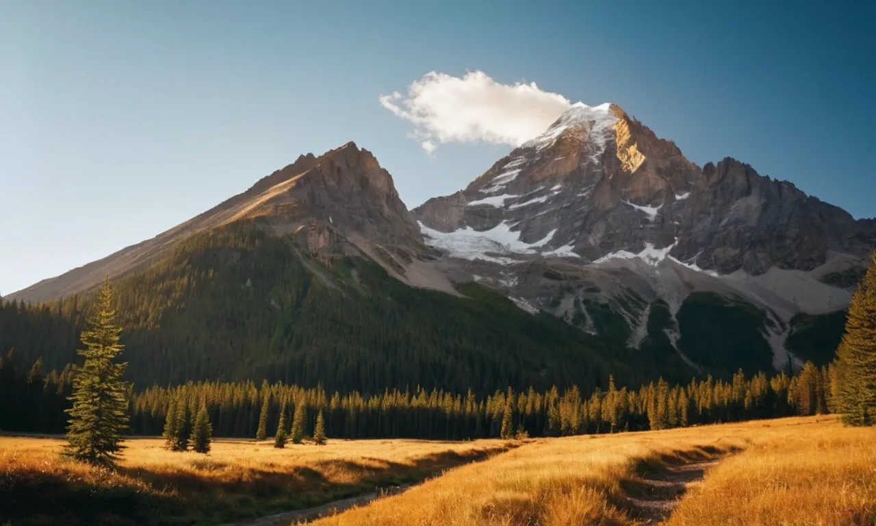 A breathtaking capture of a towering mountain peak, bathed in golden sunlight, evoking a sense of awe and majesty, symbolizing the enigmatic allure of the Mountain of God.