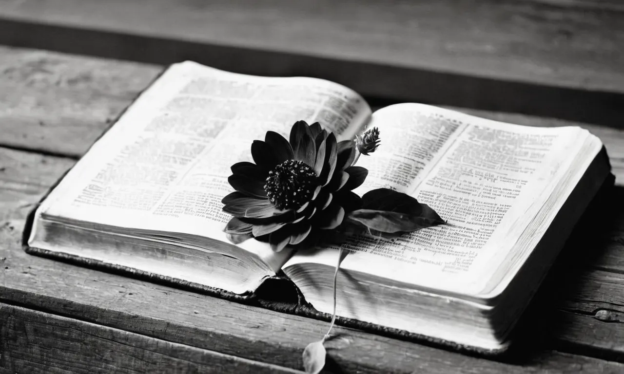 A black and white image capturing a weathered Bible lying open on a rustic wooden table, with a solitary wilting flower placed upon its pages, symbolizing the struggle of unbelief.