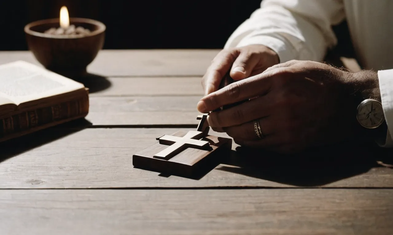 A black and white photo capturing Luke's Gospel, open on a table, while a pair of hands reverently hold a small wooden cross, symbolizing Luke's profound relationship with Jesus.