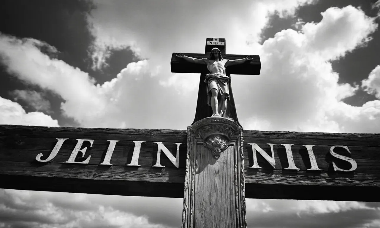 A powerful black and white image capturing a rugged wooden cross against a dramatic sky, emphasizing the inscription "INRI" - Jesus of Nazareth, King of the Jews.