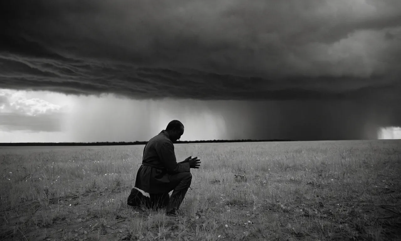 A haunting black and white image shows a solitary figure kneeling in a barren field, their hands bloodied, as storm clouds gather overhead, questioning the morality of when divine intervention permits bloodshed.