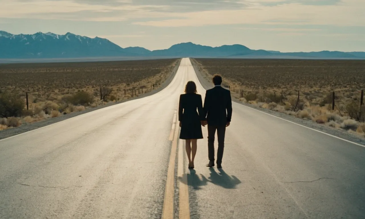 A photograph capturing a couple standing at opposite ends of a long, deserted road, symbolizing the emotional distance and divine intervention in their journey towards divorce.