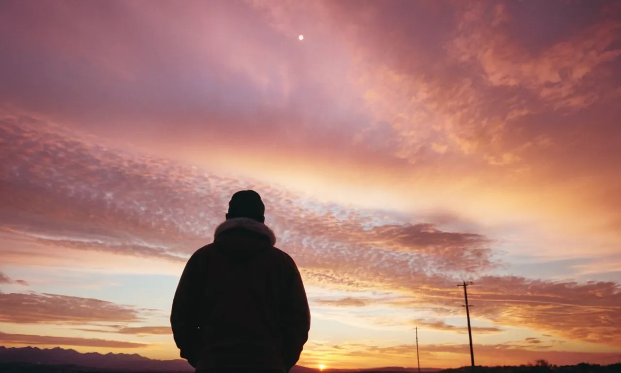 A radiant sunset paints the sky in hues of gold and pink, while a single figure stands in awe, their heart illuminated, symbolizing the divine connection between two souls.