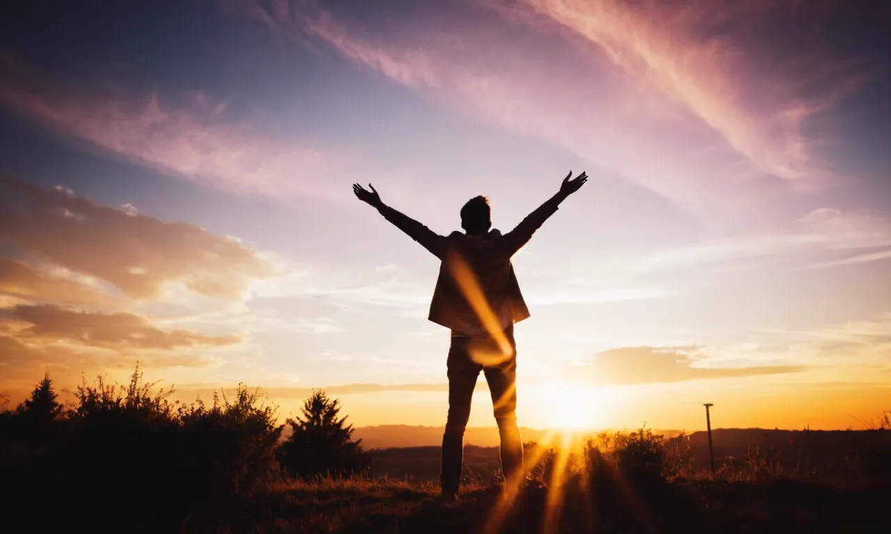 A silhouette of a person standing beneath a vibrant sunset, their outstretched arms reaching towards the sky, as rays of light cascade down, creating a heavenly glow around them.