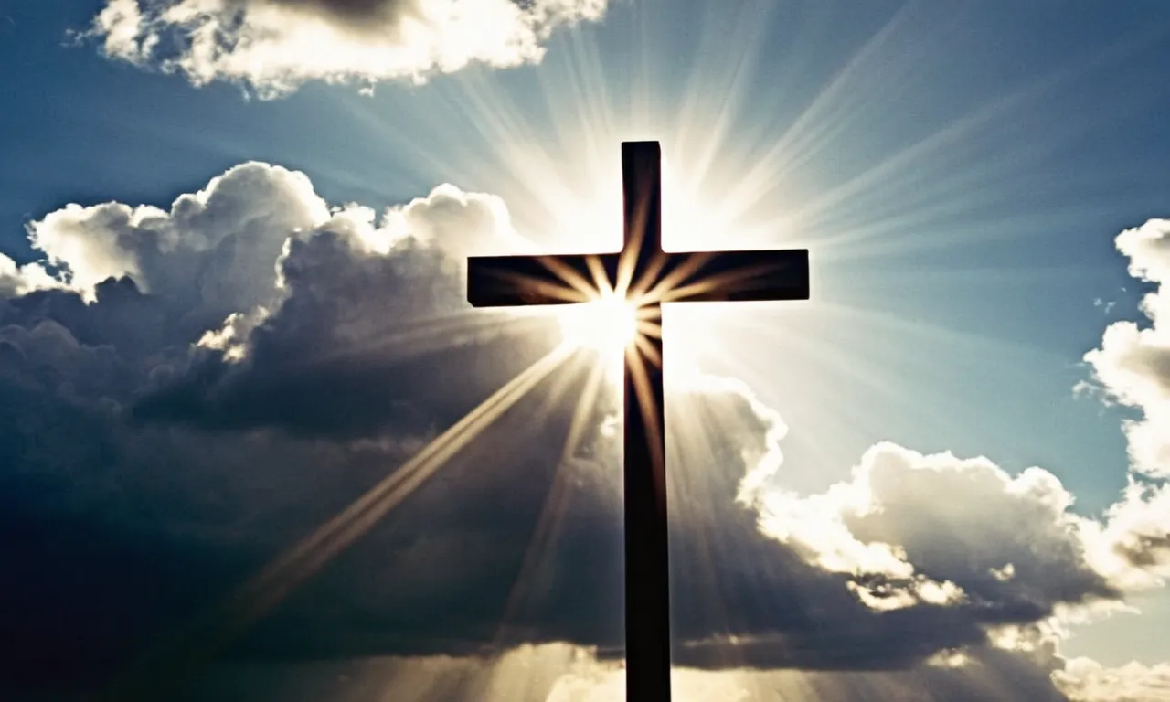 A photograph capturing the radiant sunlight piercing through the clouds, illuminating a cross-shaped shadow, symbolizing the glorious moment when Jesus was exalted and glorified.