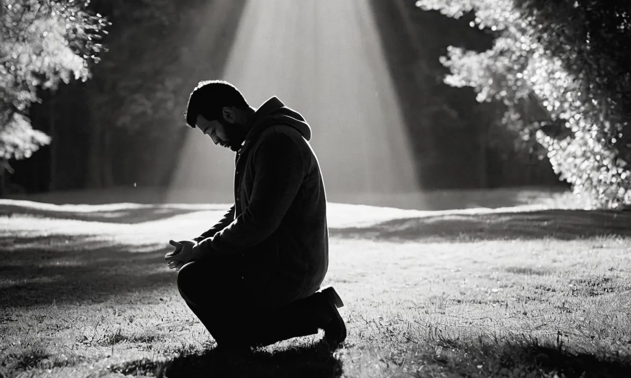 A powerful black and white image captures a man, kneeling in prayer, his face bathed in ethereal light, seeking answers to the age-old question, "Who is God's favorite son?"