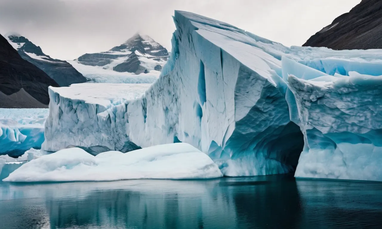 A photo showcasing a majestic glacier, bathed in ethereal blue hues, evoking a sense of power and mystery, capturing the essence of the enigmatic god of ice.