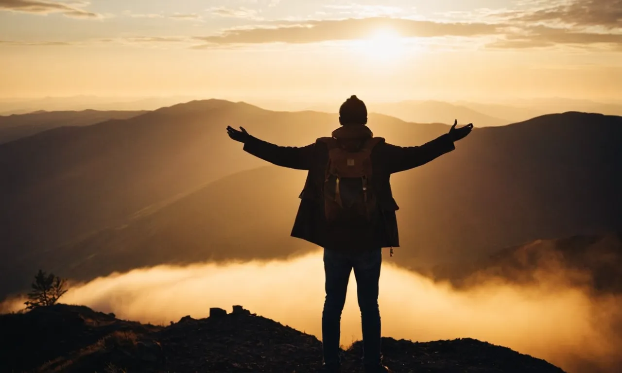 A photo capturing a silhouette of a person standing on a mountaintop, bathed in warm, golden light, symbolizing the hope and faith that believing in Jesus brings to their life.