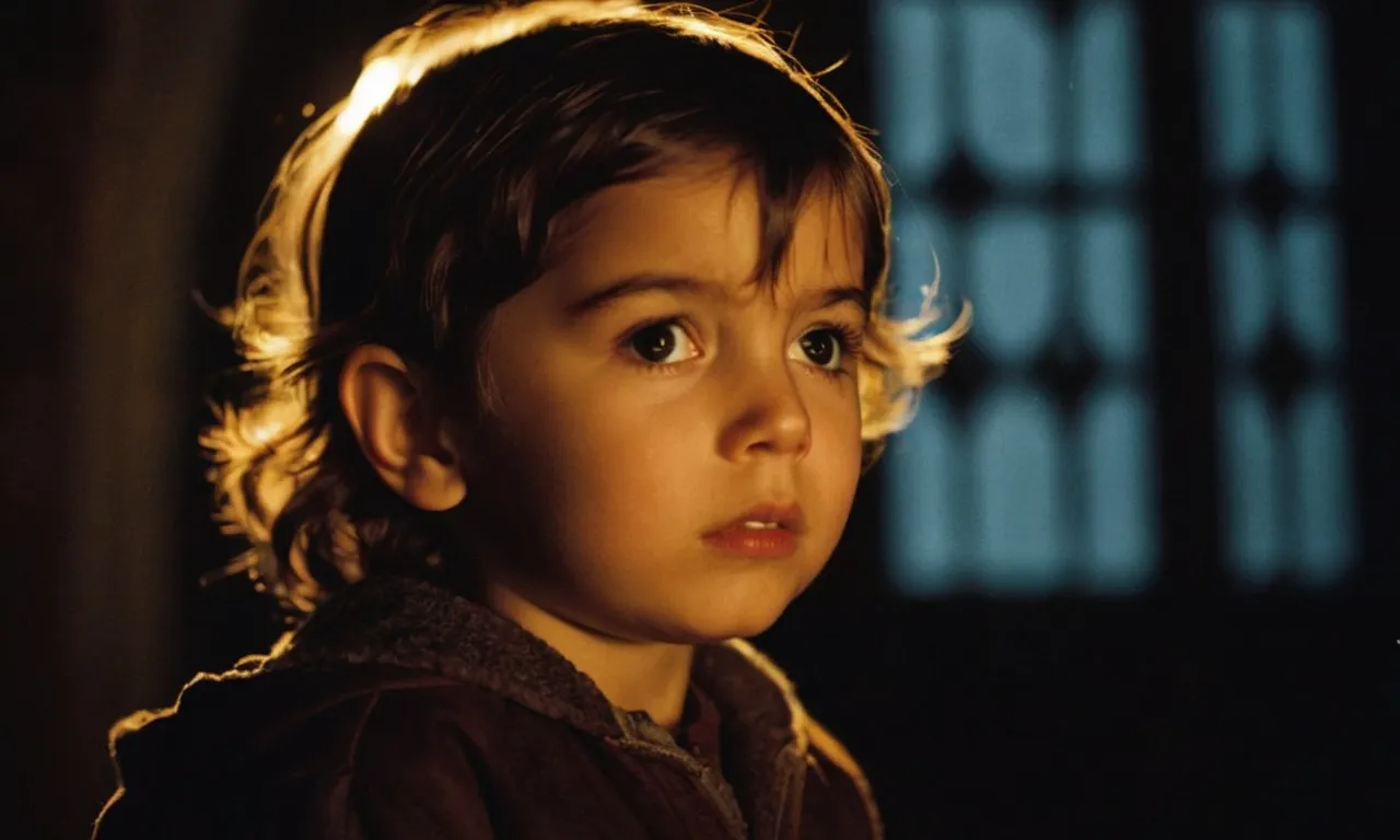 A poignant photograph captures a child's tear-streaked face, illuminated by candlelight, questioning the heavens above, as darkness looms in the backdrop, questioning why God allows the persistence of evil.