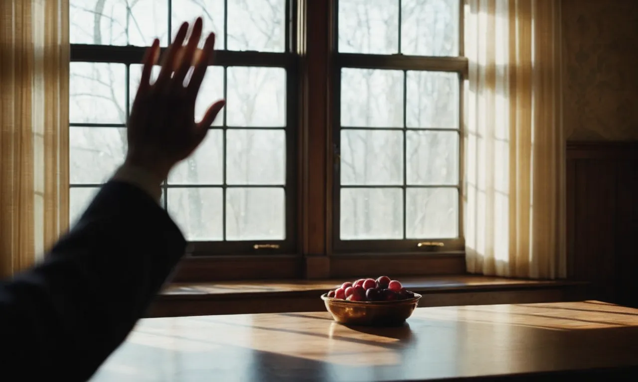 A solemn figure stands alone in a dimly lit room, their outstretched hand reaching towards a ray of light streaming through a window, symbolizing the longing and questioning of why God seems distant.