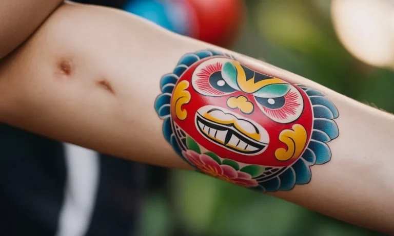 Daruma Doll Tattoo Meaning: Exploring The Symbolism Behind This Iconic Japanese Design