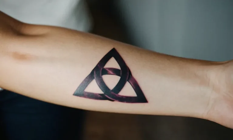 Infinity Triangle Tattoo Meaning: Exploring The Symbolism Behind This Enigmatic Design